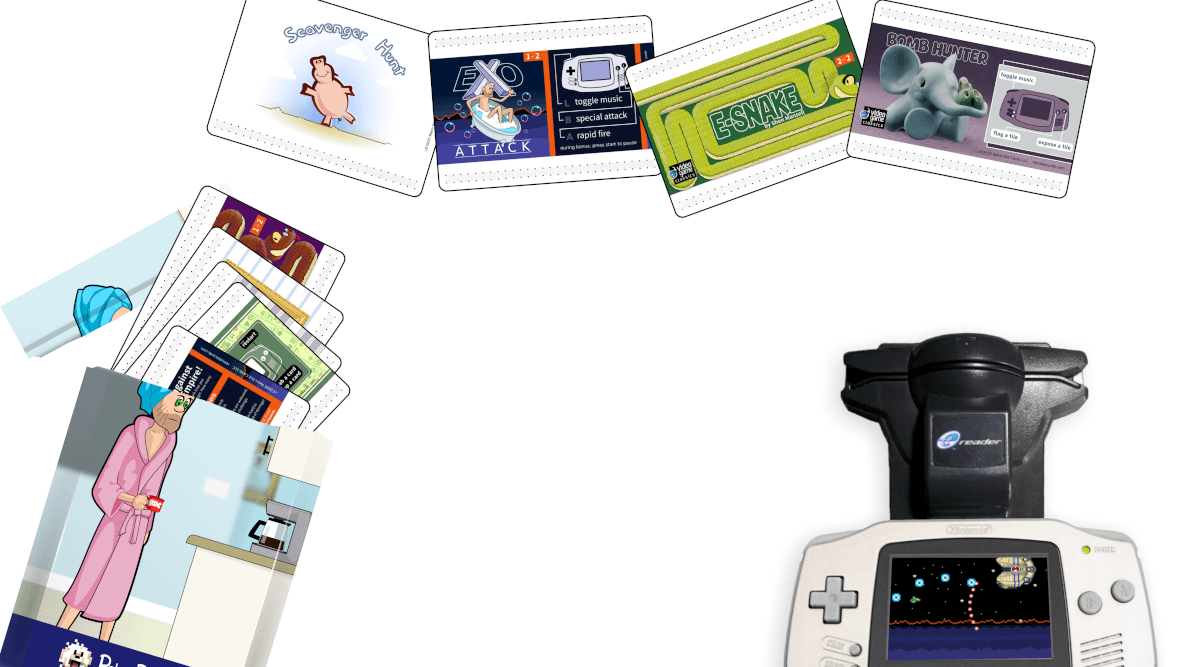 Opened pack of cards next to a GBA with an E-Reader plugged in