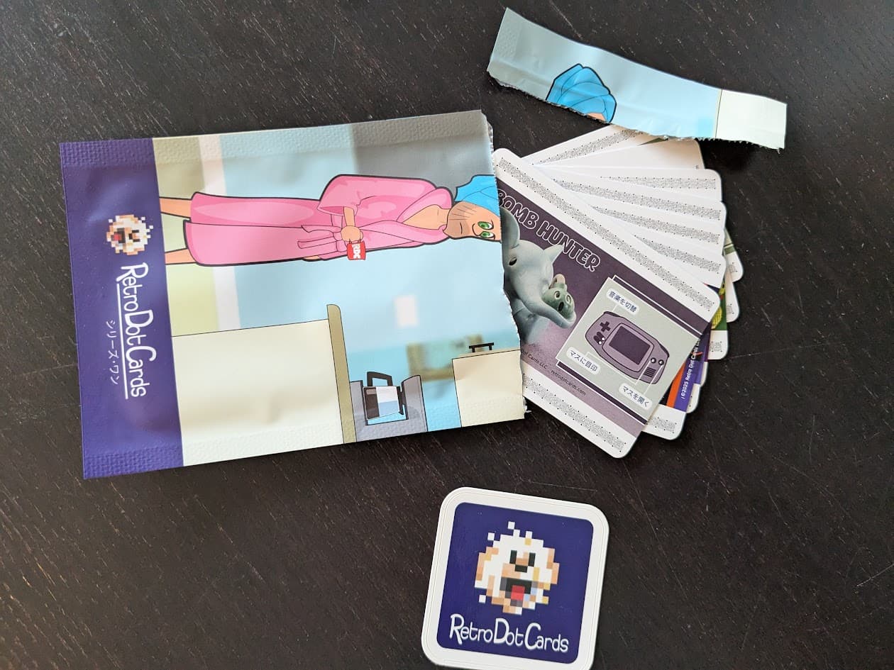 Japanese Retro Dot Cards fanning out and coming out of an open pack